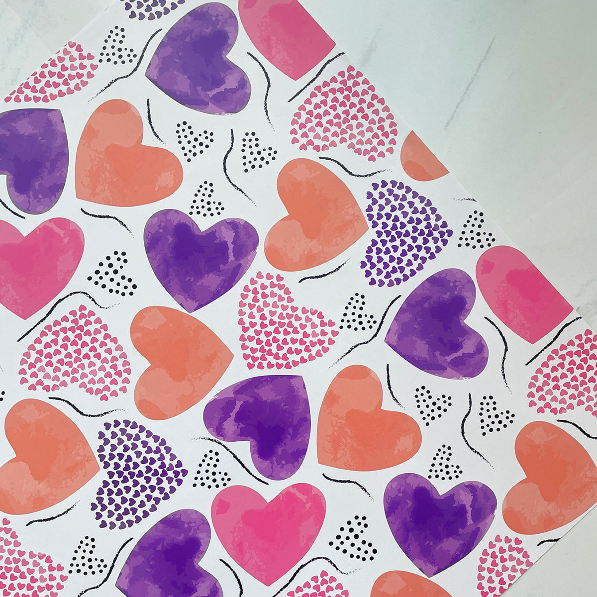 Orange and purple hearts wrapping paper