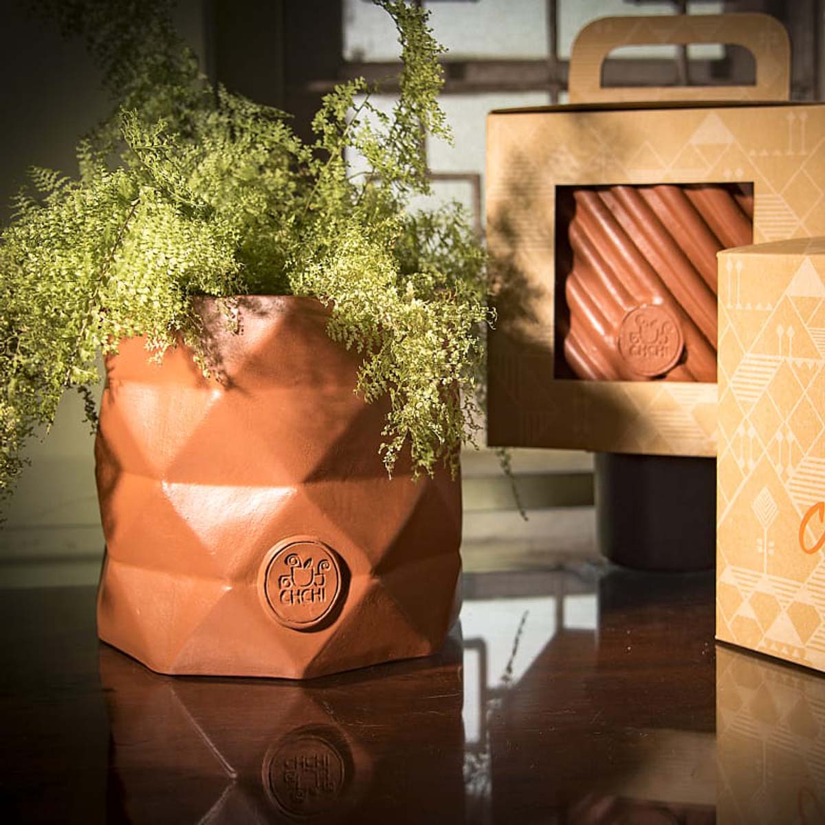 Triangle Clay Pot – Who We Are
