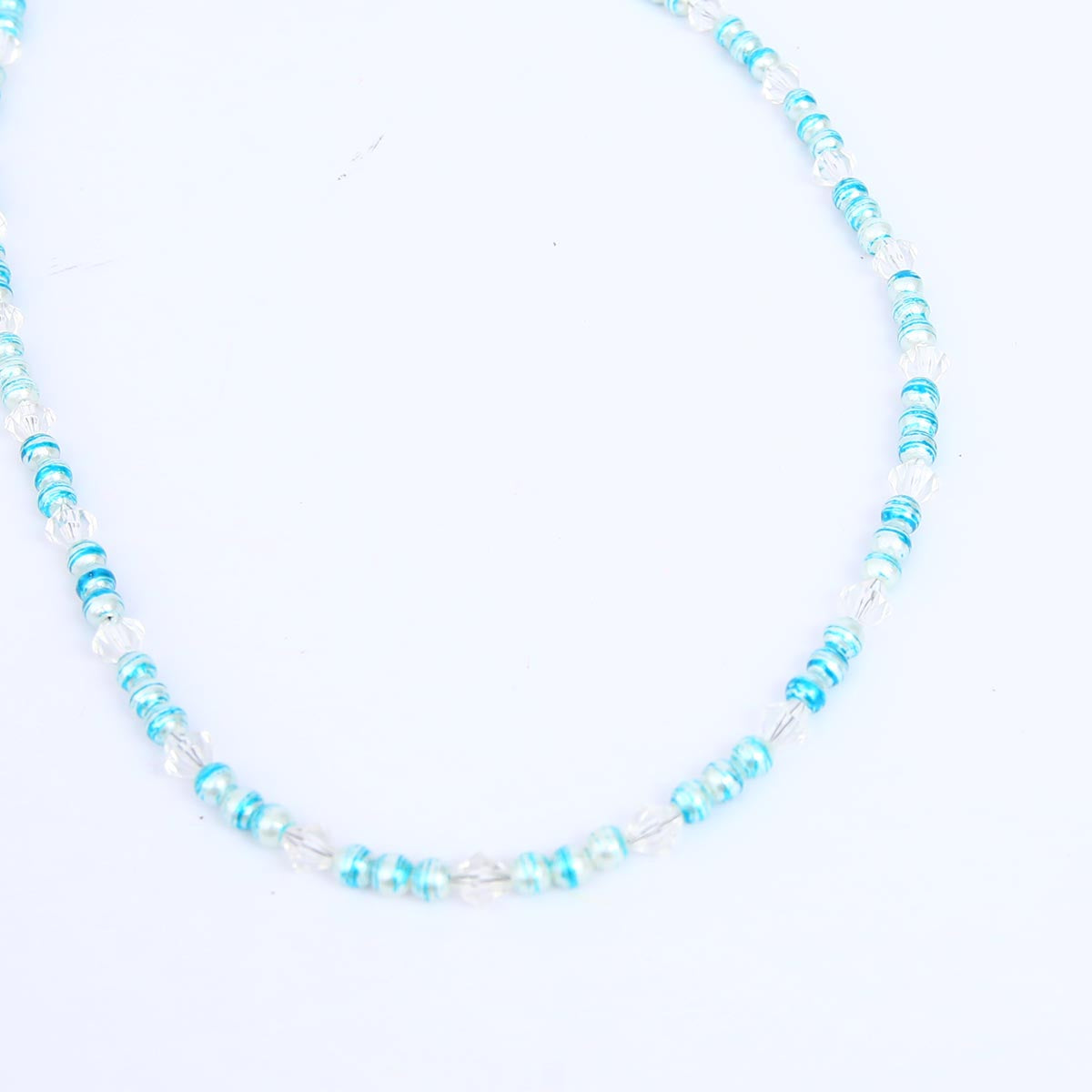 Cyan and clear beaded necklace