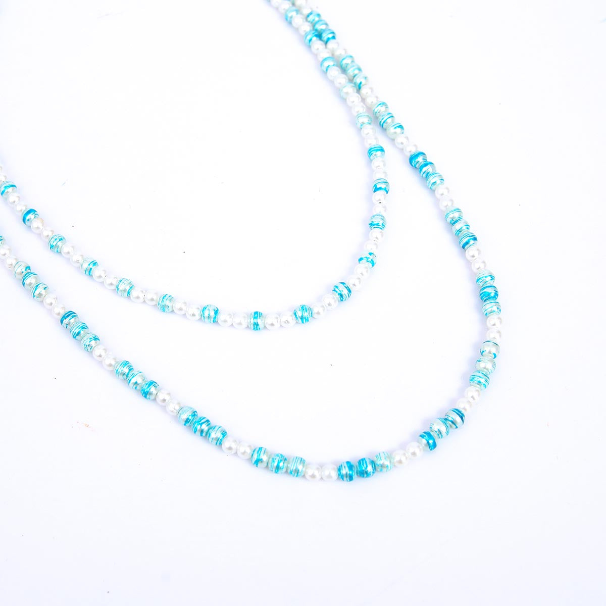 Double layered cyan and clear beaded necklace