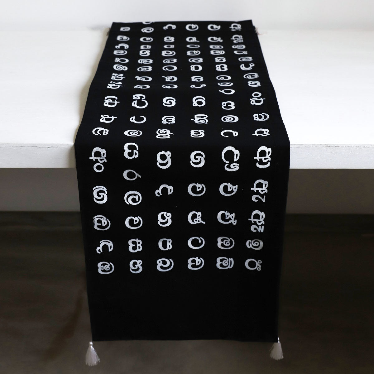 Black Sinhala Letter Table Runner